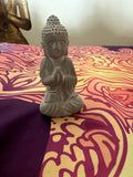 Bettende Buddhafigur