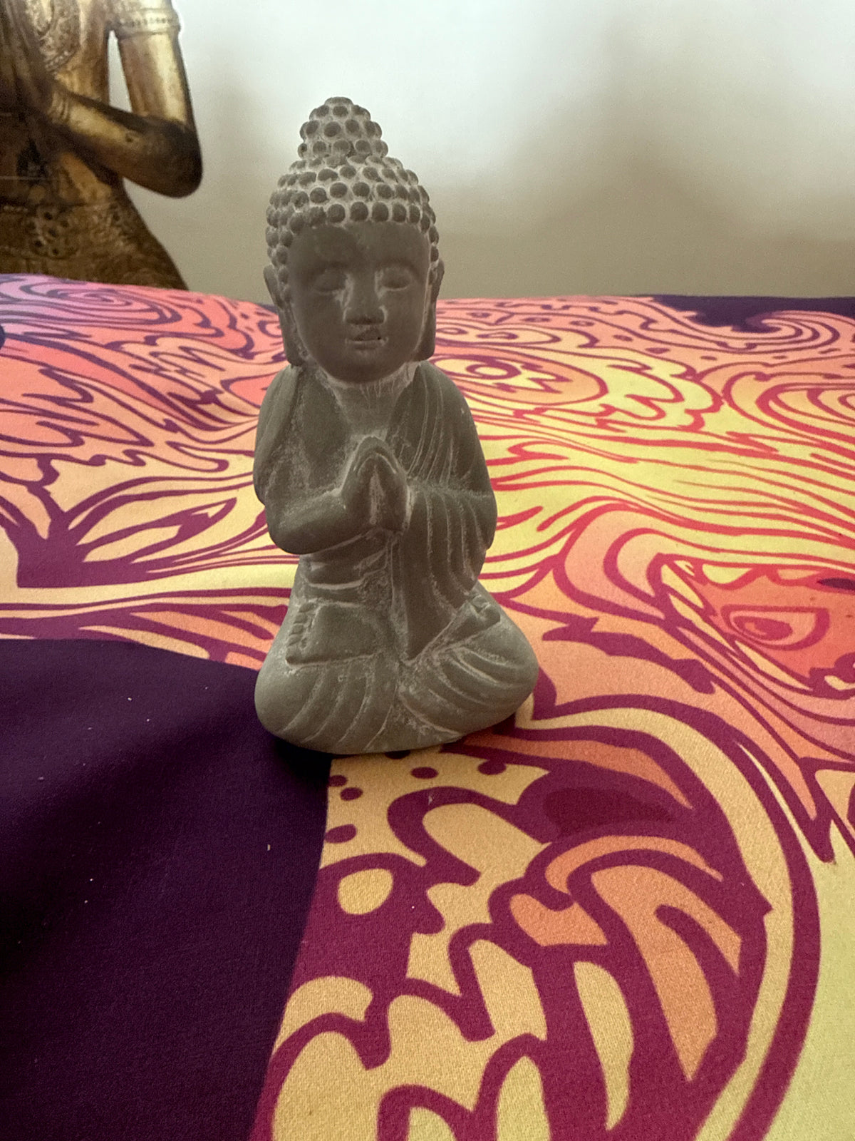 Bettende Buddhafigur