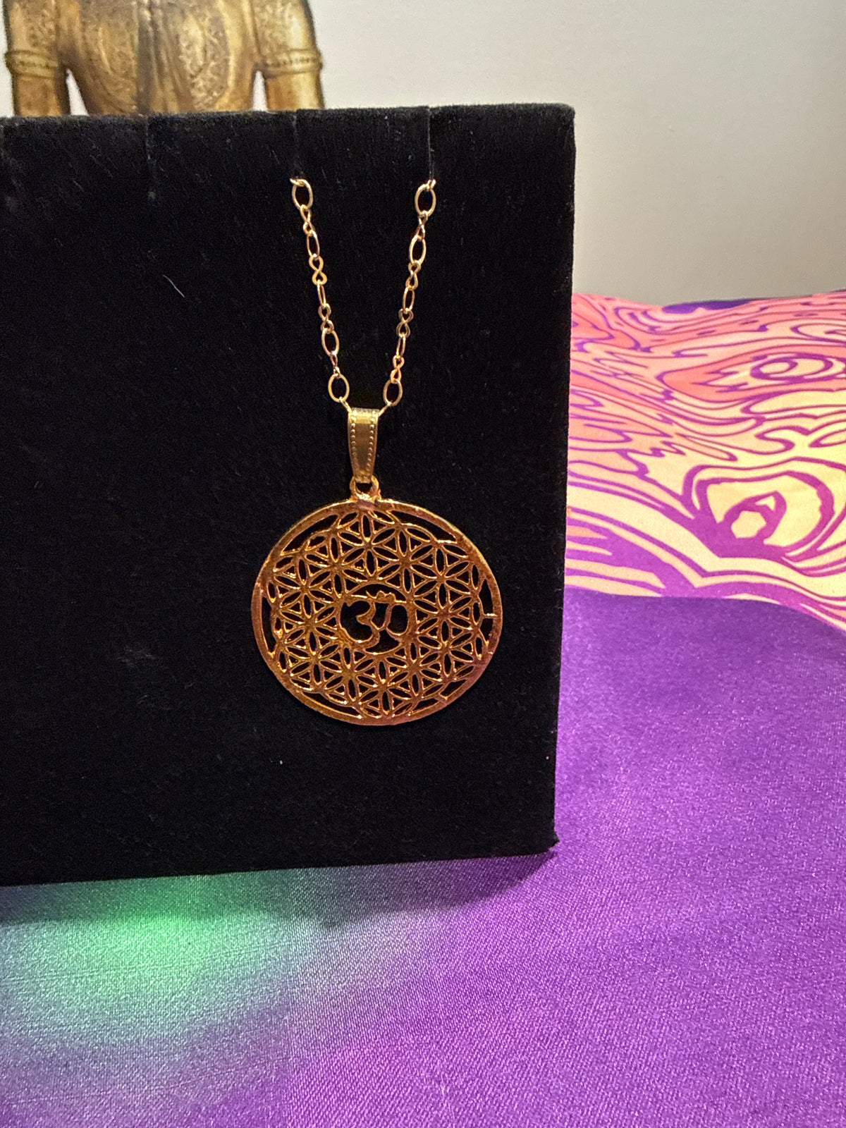 Goldene OmKette